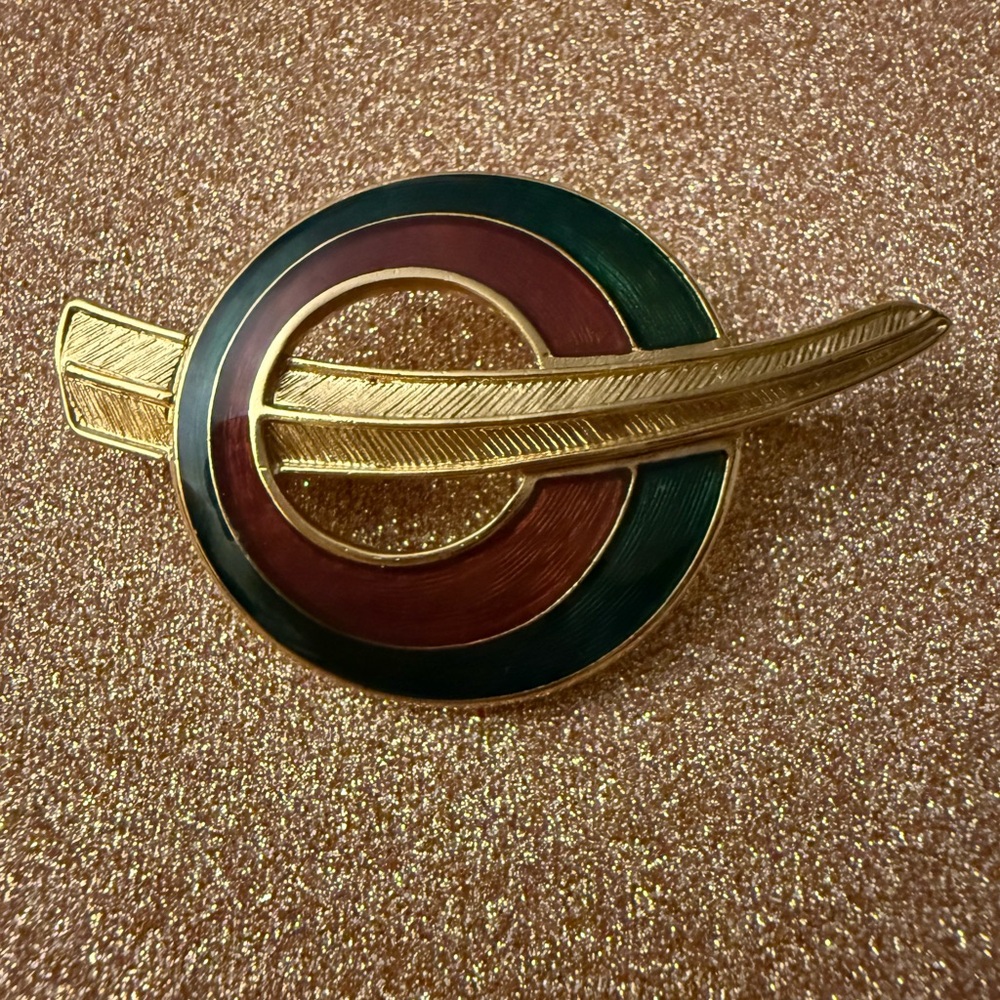 Trifari Gold-Tone Enamel Circle Brooch with Red and Green Accents